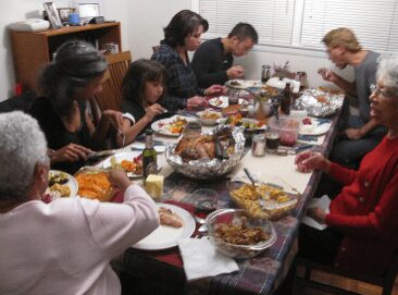 A family on the dining table having meal together