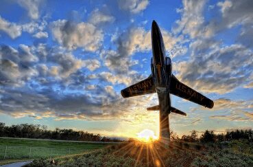 The statue of a jet plane facing the sky